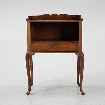 A rococo style bedside table, early 20th Century.
