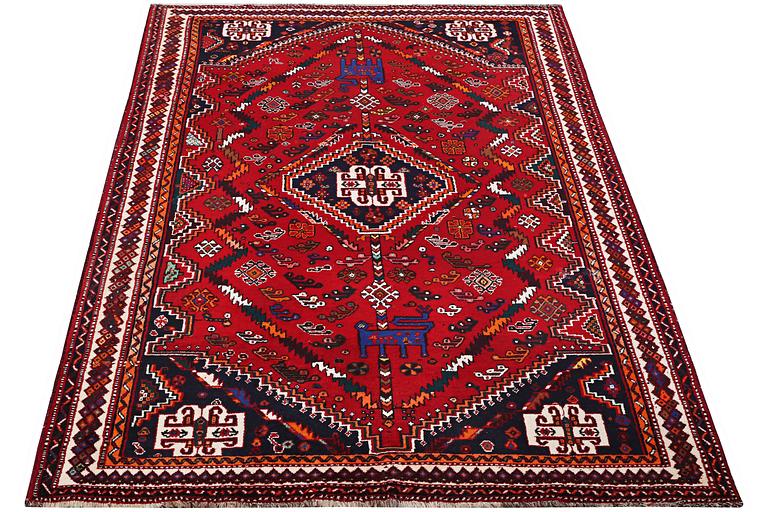 A Qashqai carpet, c. 252 x 162 cm.