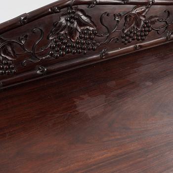 A Chinese hardwood shelf, 20th century.