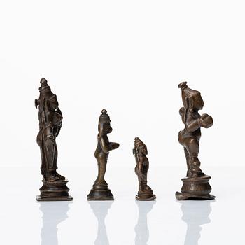 A group of four bronze miniature sculptures, India, 19th Century or older.