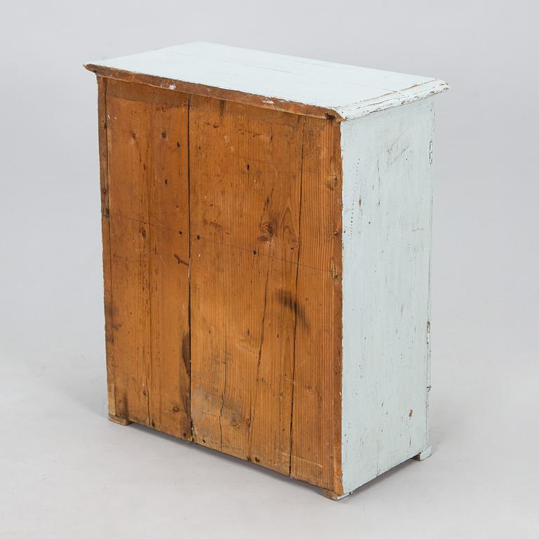 A painted cabinet, circa 1900.