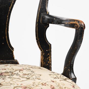 A pair of rococo armchairs in the manner of C. M. Sandberg, later part 18th century.