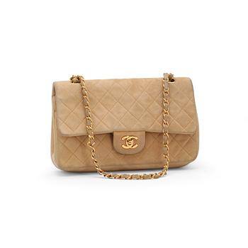 647. CHANEL, a beige suede quilted "double flap" shoulder bag.