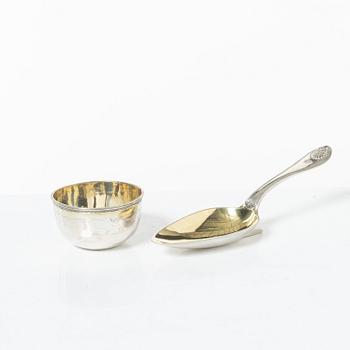 A parcel-gilt silver tumbler and medicine spoon, Sweden 18th-19th Century.