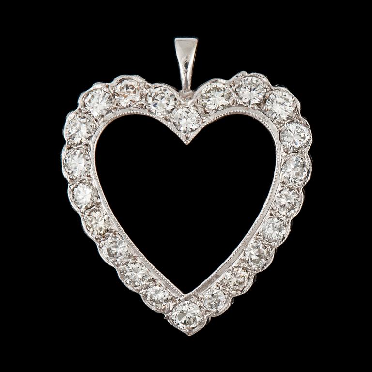 A diamond  pendant in the shape of a heart. Total carat weight circa 2.20 cts.