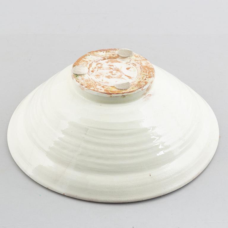 A faience bowl, circa 1900.