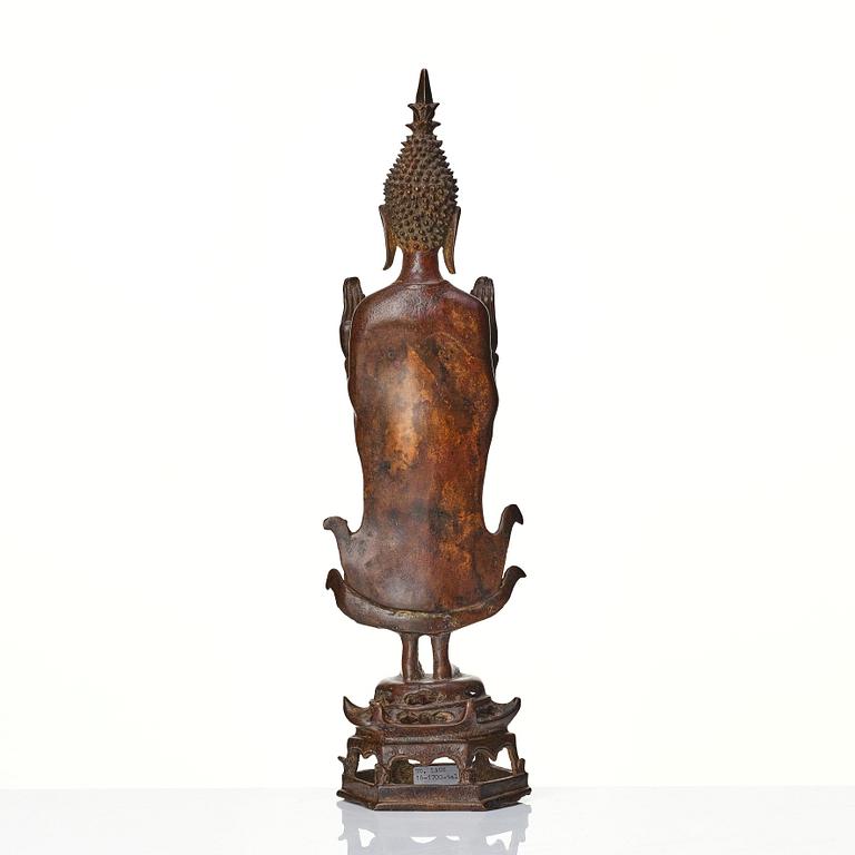 A standing sculpture of buddha, Laos, 18th Century.