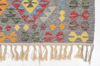 A Kelim carpet, c. 309 x 180 cm.
