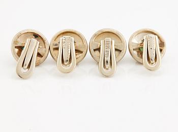 A pair of jade cufflinks and studs from Buccellati.
