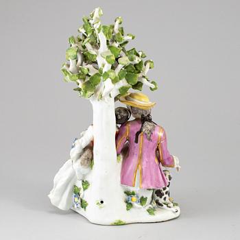 A porcelain figurine group, first half of the 20th century.