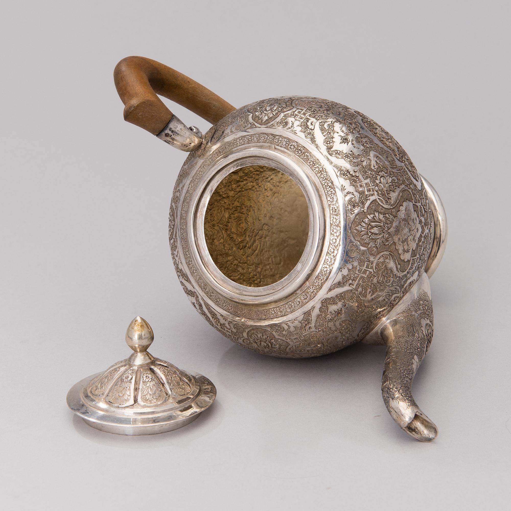 A Persian coffee set in silver, 7 pcs, Iran 20th century. Total weight circa 1334 g.