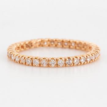 Brilliant-cut diamond eternity ring.