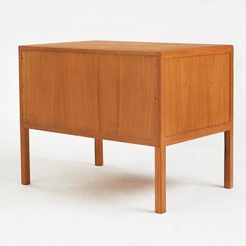 Carl-Axel Acking, a chest of drawers and wall mirror, for The Hotel Malmen, Svenska Möbelfabrikerna Bodafors, Sweden, 1940-50's.