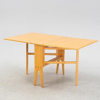 A 'Talavid' birch gate leg table by Carl Malmsten, end of the 20th Century.