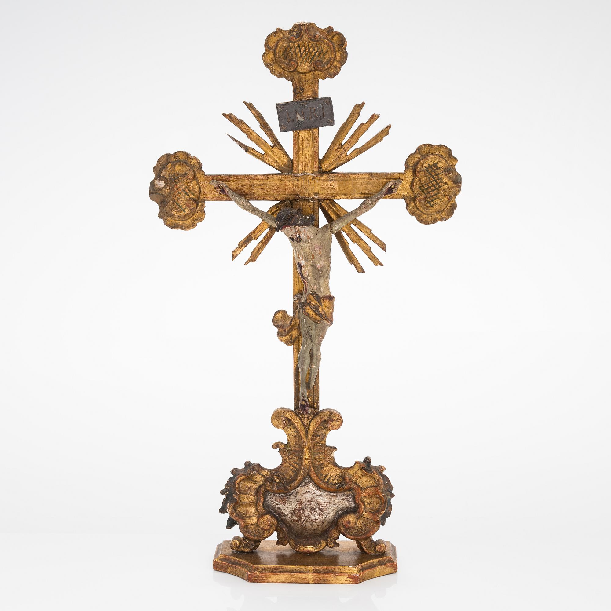 A 19th century gilded and painted wood crucifix.