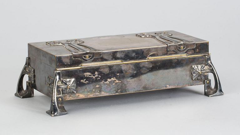 SMYCKESSKRIN, nysilver, jugend, 1900-talets början.