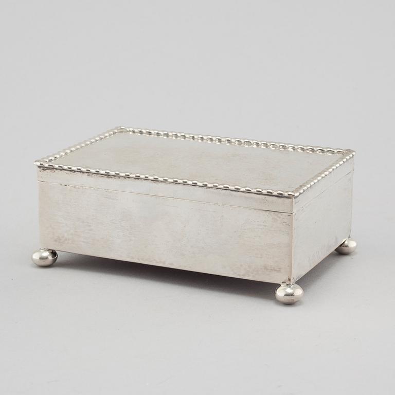 A silver cigar box from K Andersson in Stockholm, 1917.