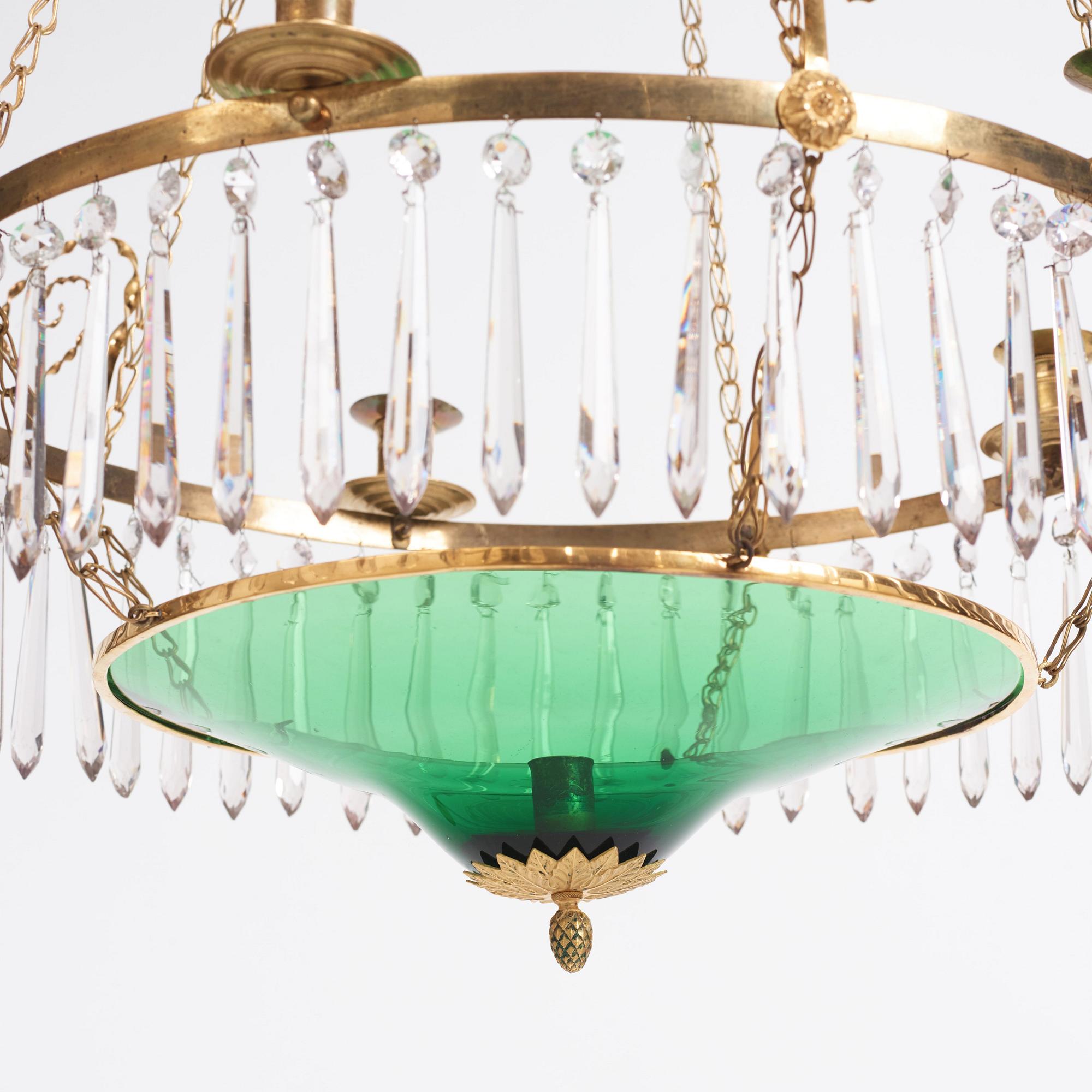 A late Gustavian gilt-brass and green glass six-light chandelier, late 18th century.