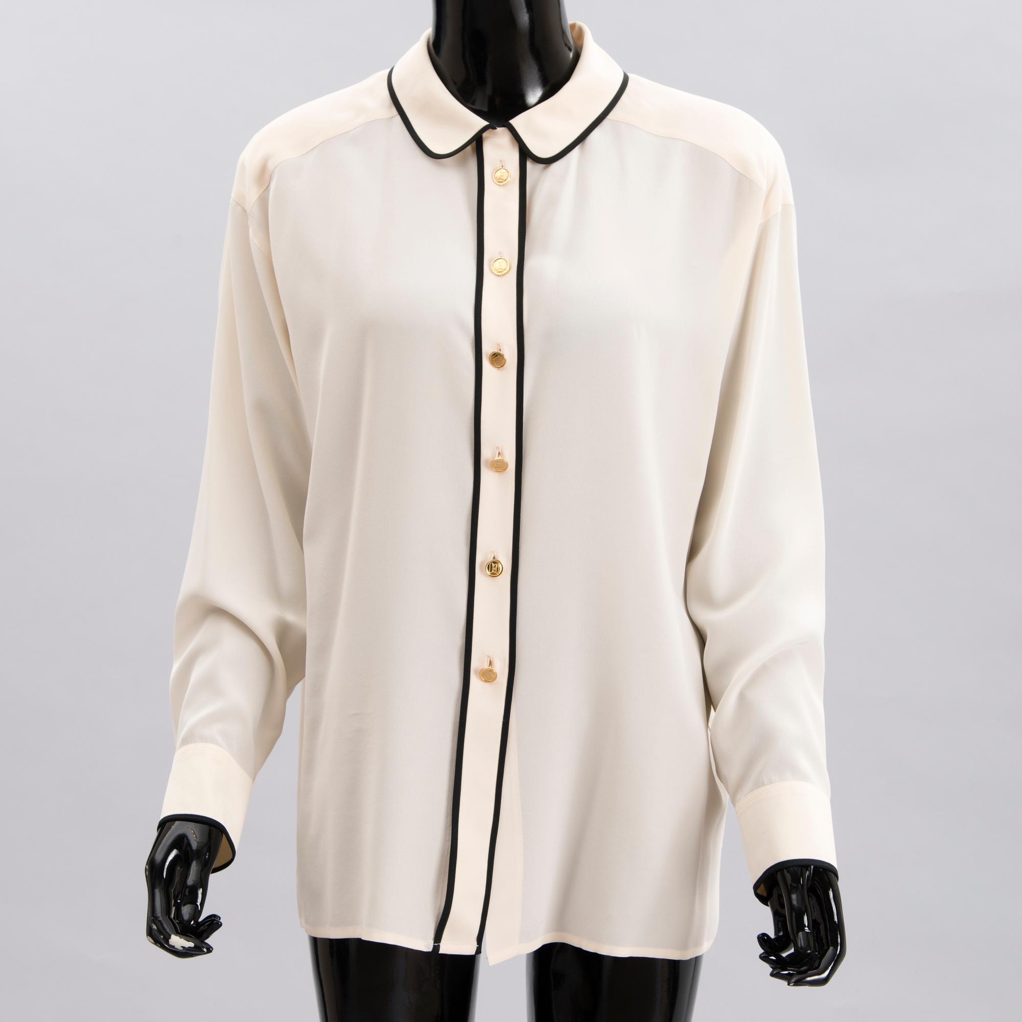 Two Chanel Crepe de Chine Cream Coloured Silk Blouses.