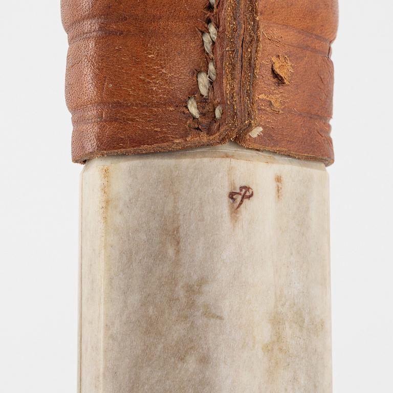 Esse Poggats, a reindeer horn knife, signed.