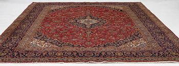 A Keshan carpet, central Iran, signed c, 392 x 301 cm.