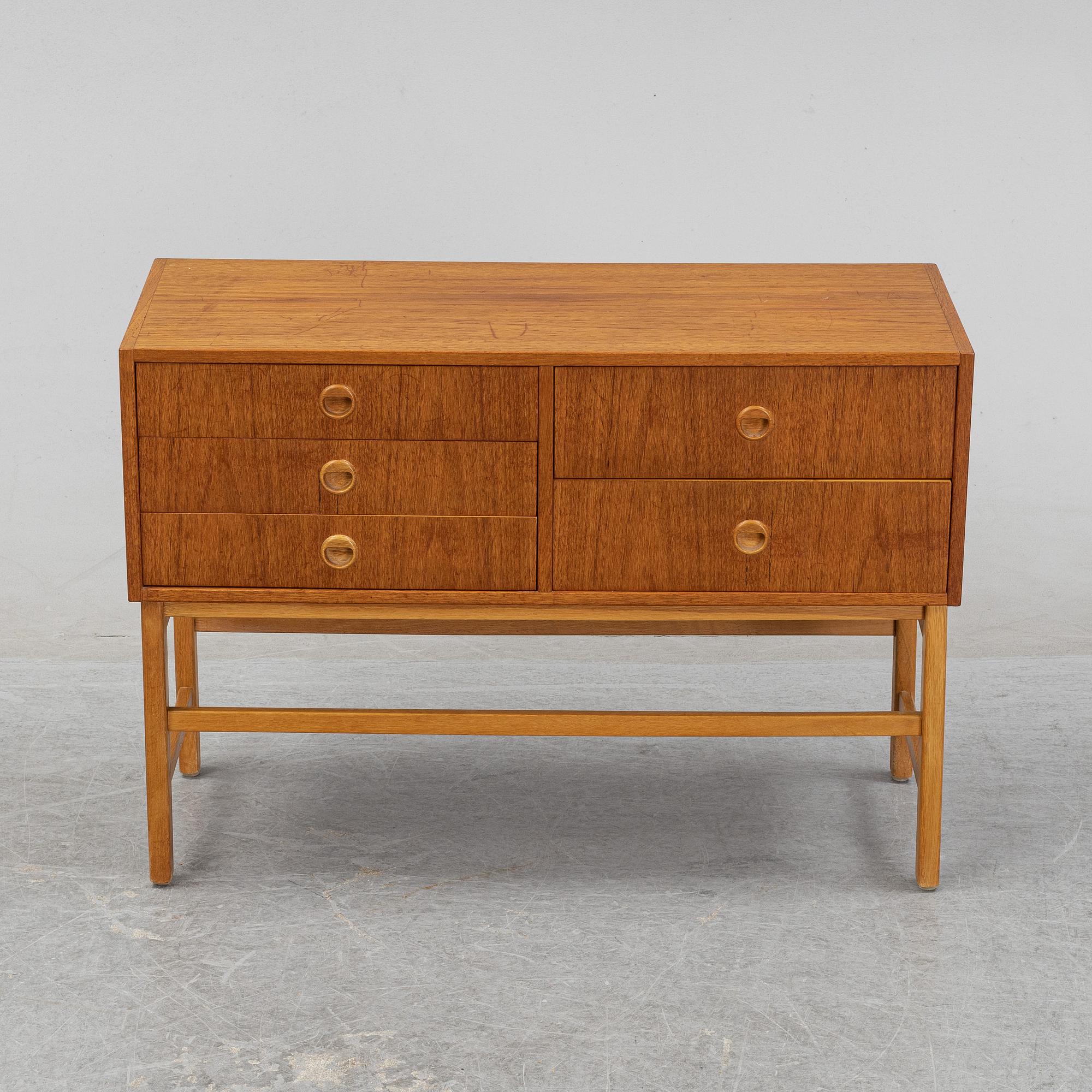 A 1950's/60's teak veneered chest of drawers.
