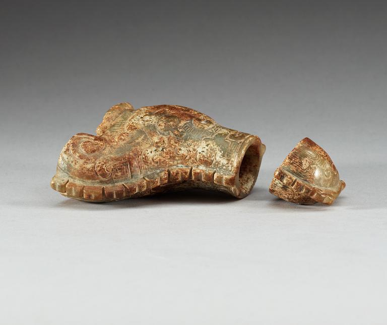 An archaistic nephrite bird shaped covered vessel.