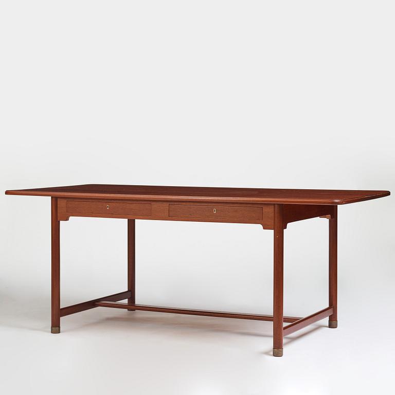 Mogens Koch, an important free standing mahogany desk by N.C. Jensen Kjær, Denmark 1930's.