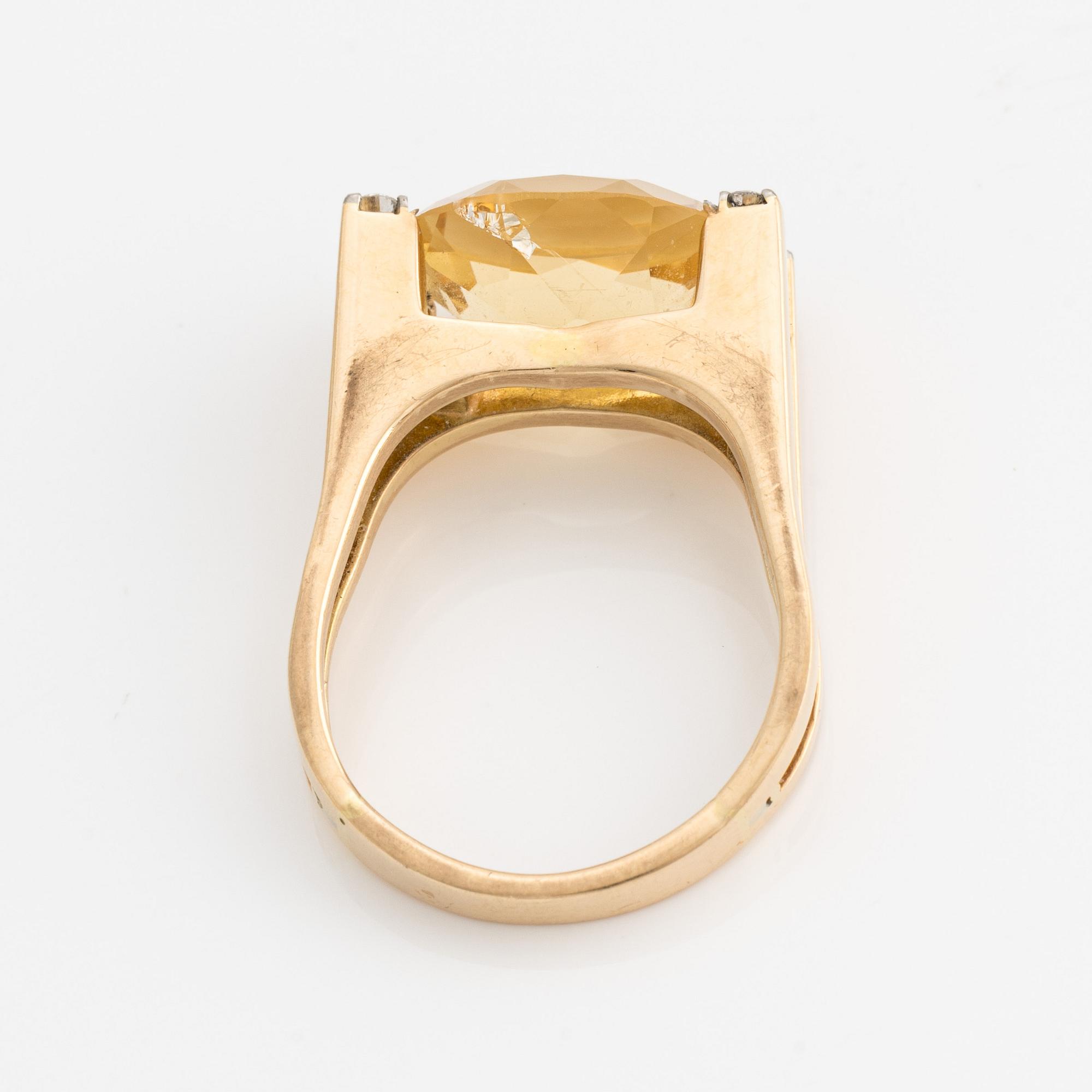Ring in 18K gold with a faceted citrine and round brilliant-cut diamonds, Stockholm 1975.