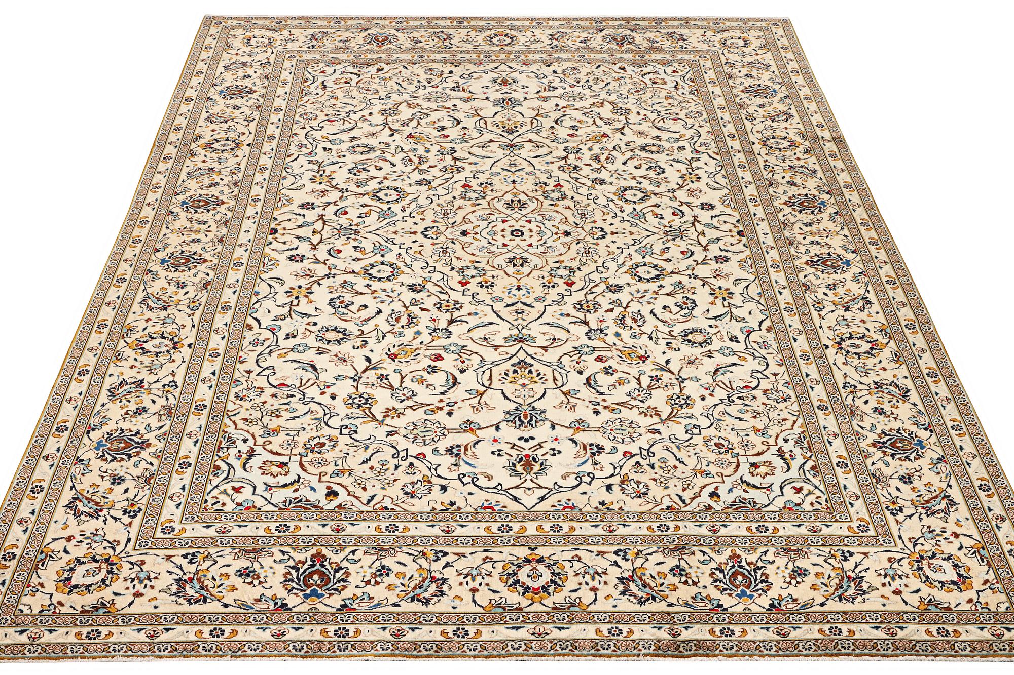 A part silk Kashan carpet, a. 353 x 244 cm.
