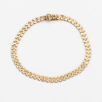 Rannekoru, 14K kultaa. Keravan Kultaseppä, Helsinki 1973.