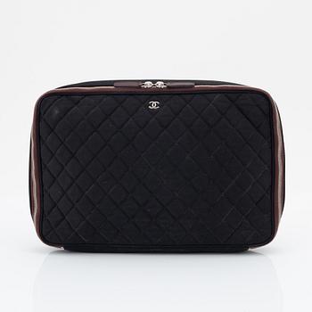 Chanel, a quilted nylon computer case, 2012.