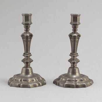 A pair of pewter Régence-style candlesticks, first half of the 20th century.