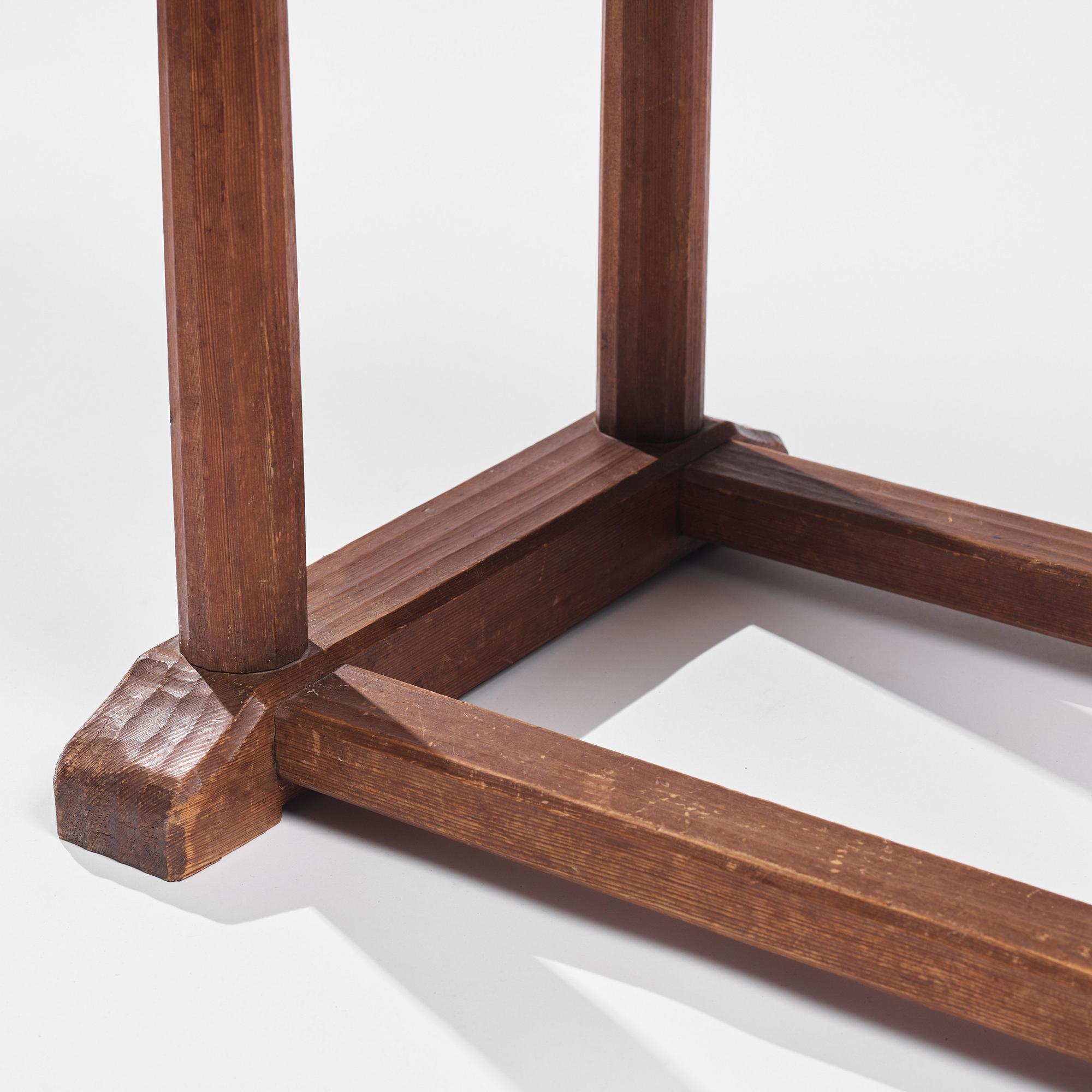 Axel Einar Hjorth, a stained pine and limestone top "Sandhamn" table, Nordiska Kompaniet, Sweden 1931.