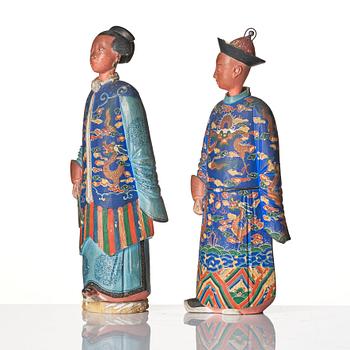 A pair of Chinese Export polychrome painted nodding head figures, Qing dynasty, early 19th Century.