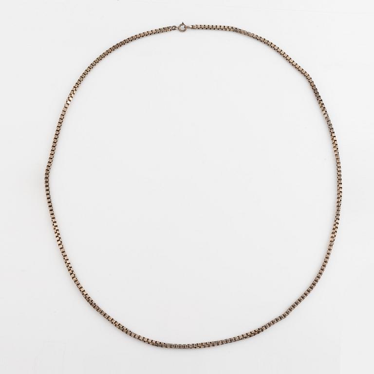 Silver necklace.