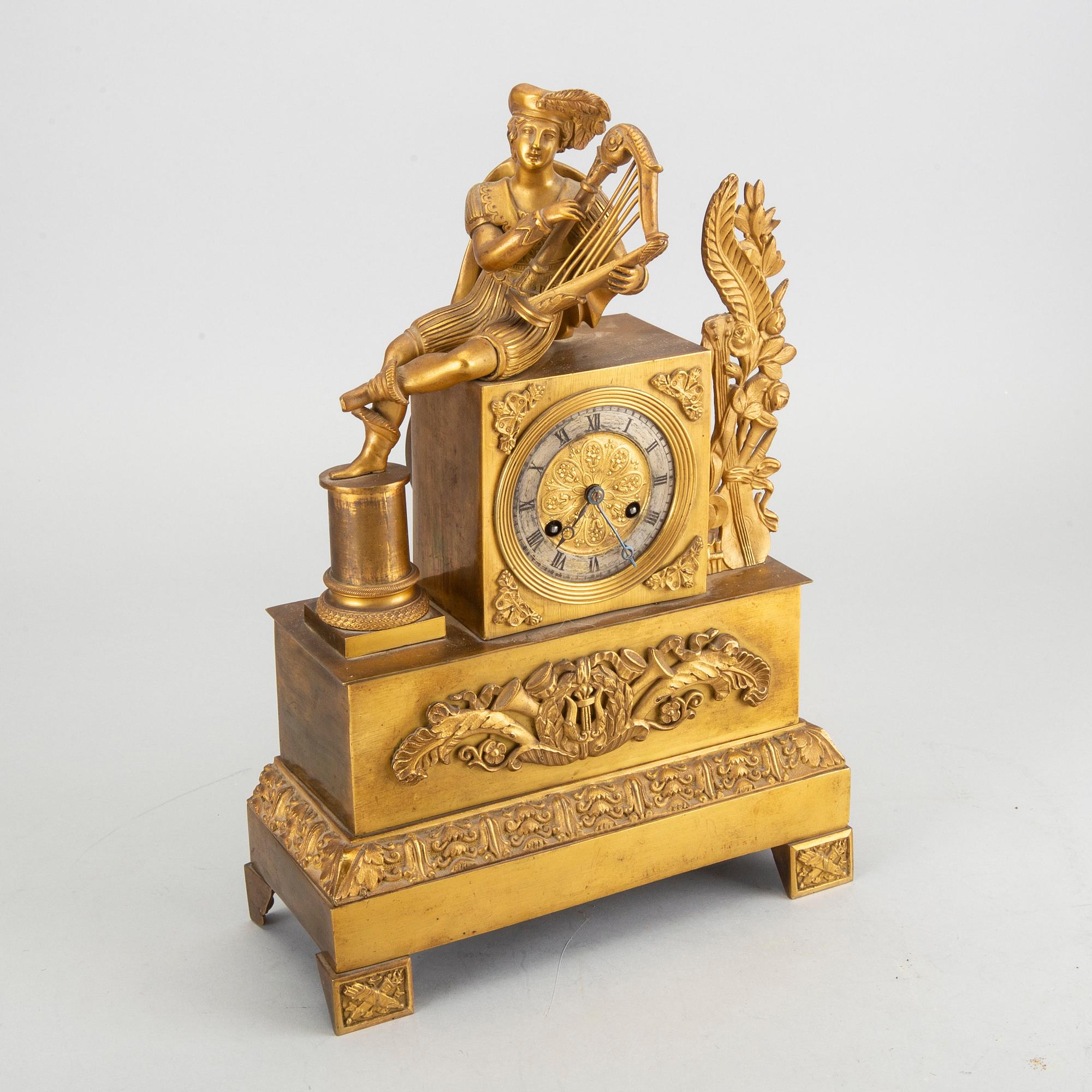 An 19th century empire mantel clock.