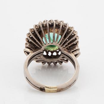 Emerald-cut emerald and eight-cut diamond ring.
