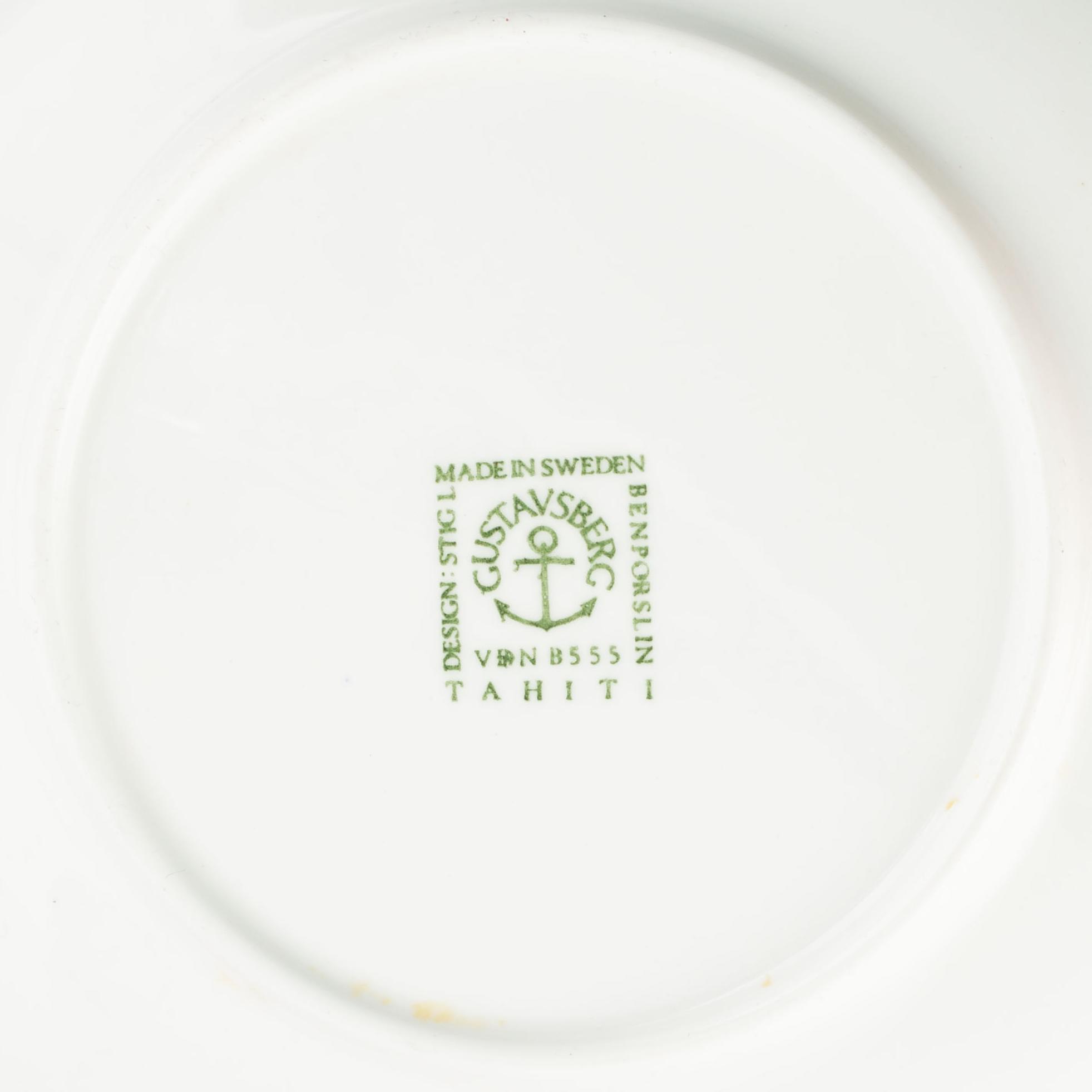 A set of four 'Tahiti' tea cups with plates by Stig Lindberg for Gustavsberg.