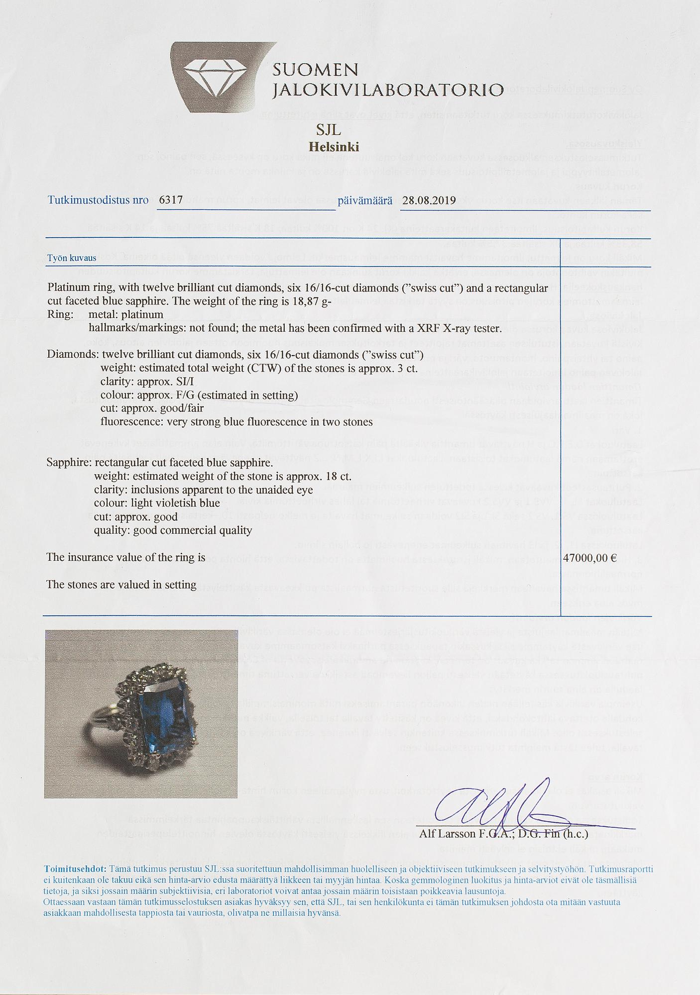 A platinum ring with a ca. 18.00 ct sapphire and ca. 3.00 cts of diamonds. With certificates.