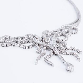 Ca 7.00 cts brilliant- and baguette-cut diamond bracelet and collier.