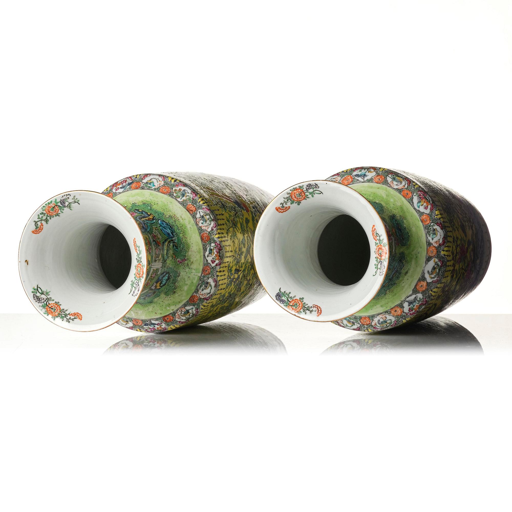 A pair of yellow ground famille rose '100 birds' vases, late Qing dynasty.