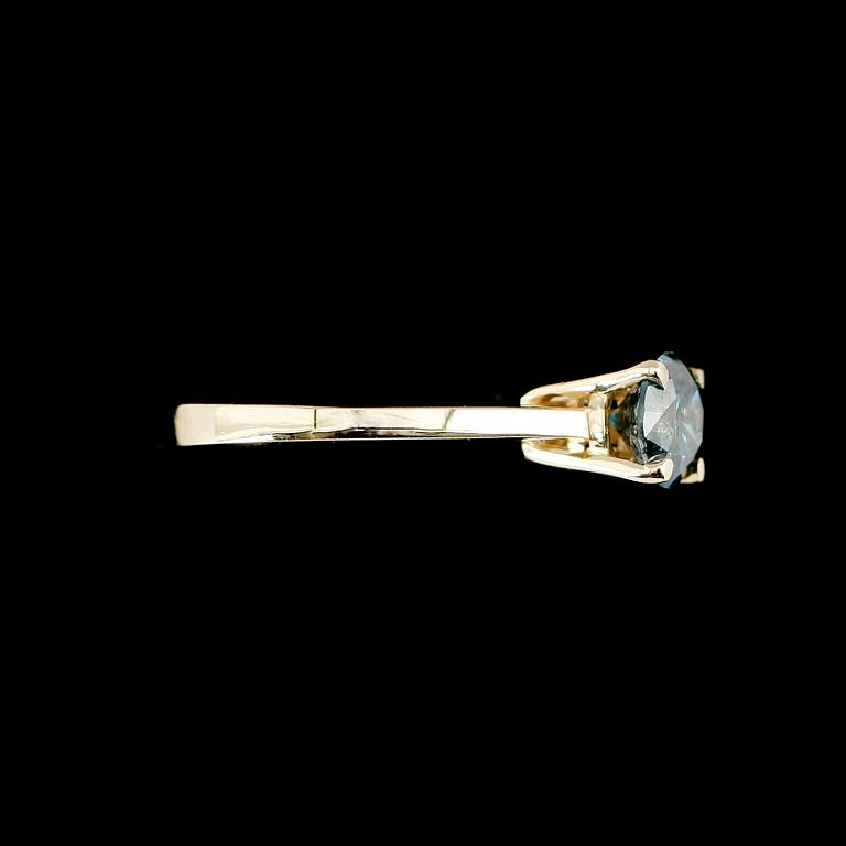 RING, 14 k guld, turkosblå briljantslipad diamant ca 0.90 ct.
