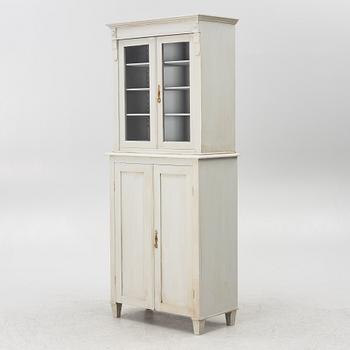 A display cabinet, early 20th century.