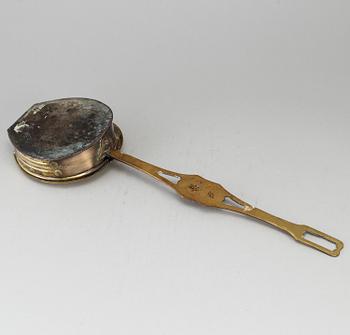 A brass chestnut roaster, 19th century.