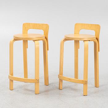 Alvar Aalto, a pair of model 'K65' birch bar chairs, Artek, Finland.