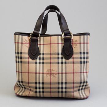 A nova-check bag by Burberry.