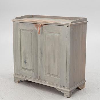 A Gustavian cupboard, circa 1800.