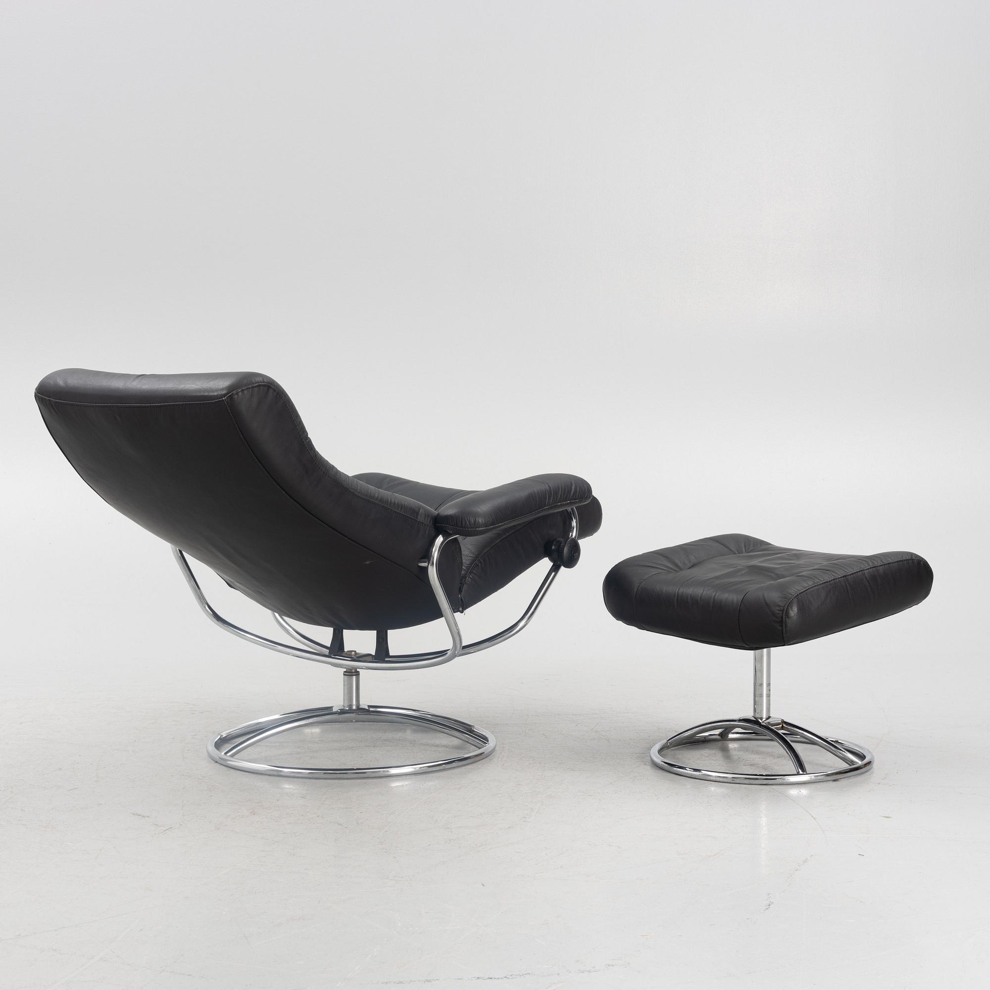 A "Stressless" armchair with ottoman, Ekornes Möbler, Norway, lend of the 20th century.