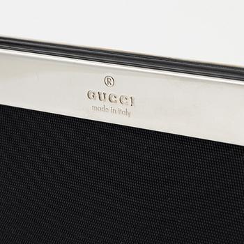 Gucci, a nylon handbag.